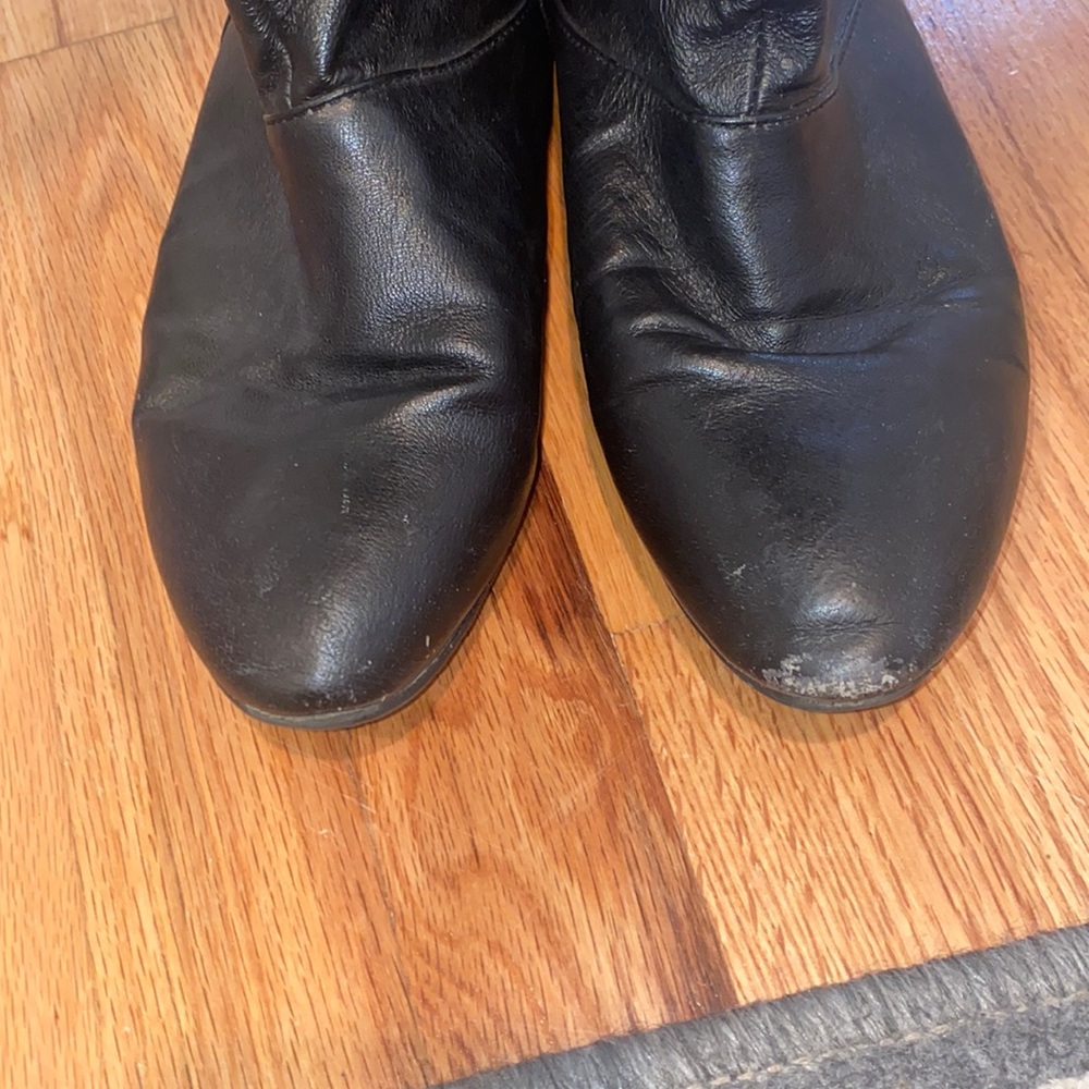 Over the knee boots. Left boot does have scuff marks. Otherwise, good condition